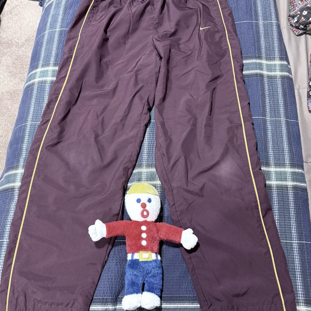 Nike Maroon Track Pants with Yellow Trim